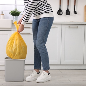 woman taking out trash